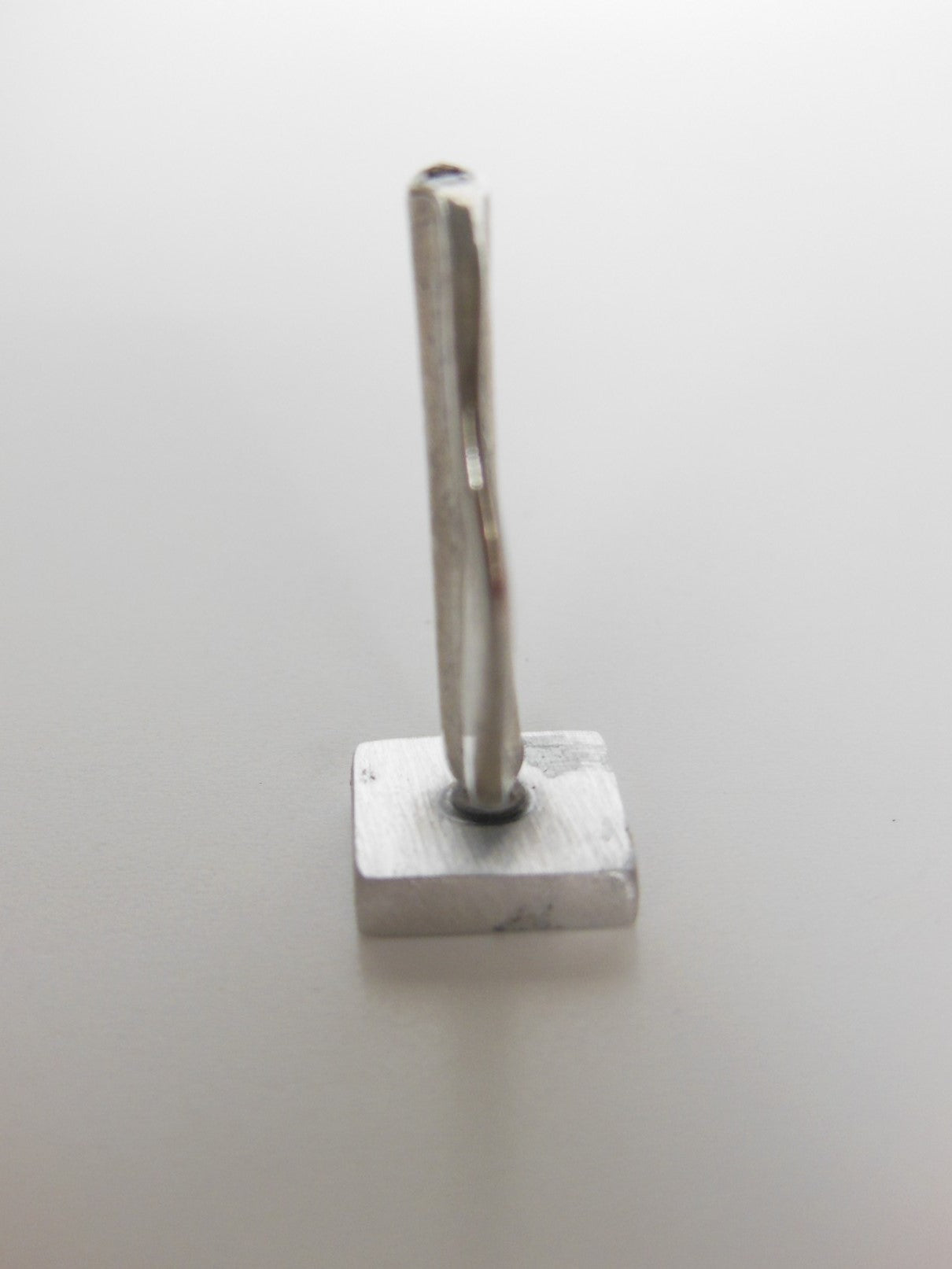 Metal Sculpture on Metal Base