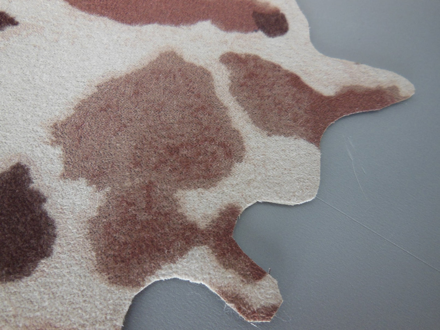 Faux Tan Cowhide Rug