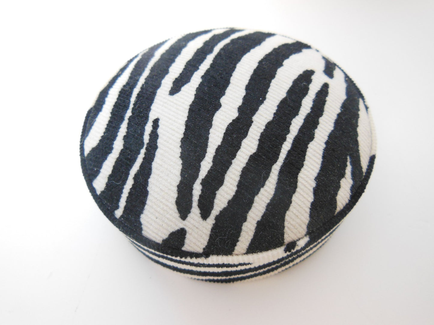 Zebra Print Round Ottoman in Black/White