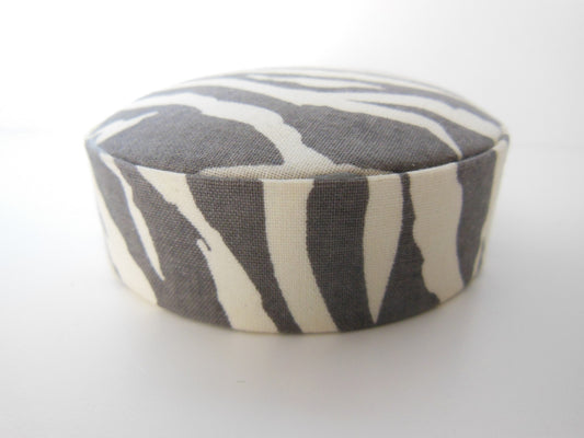 Zebra Print Round Ottoman in Gray/Cream