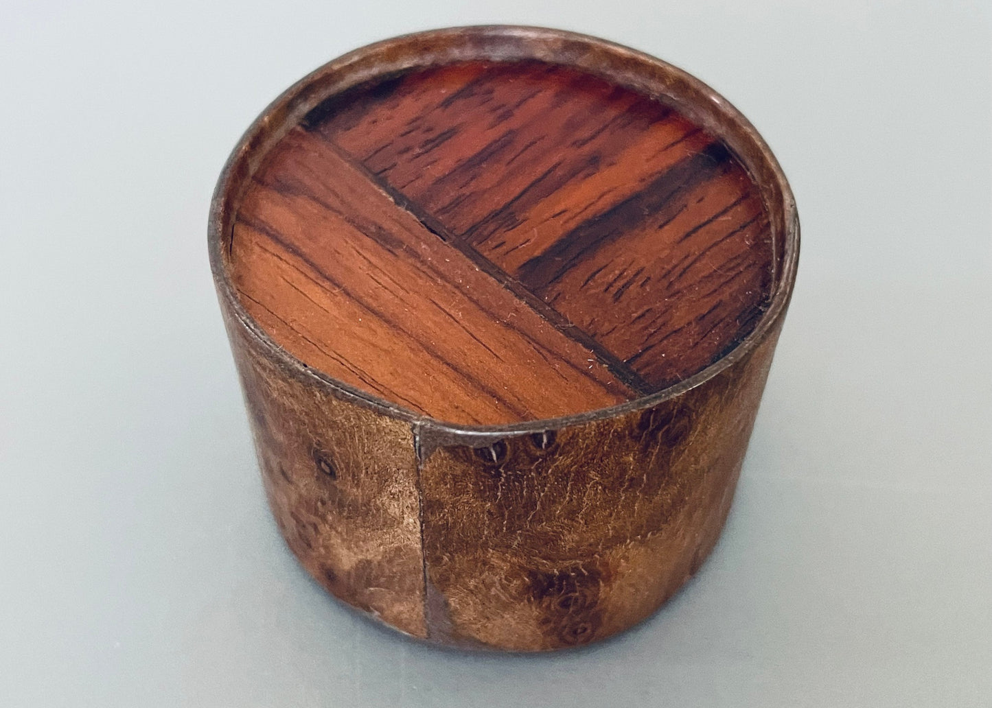 Small Round Burlwood Accent Table with M.U.T.T. Inset Top