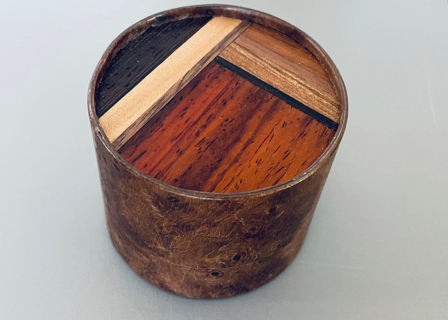 Large Round Burlwood Accent Table with M.U.T.T. Inset Top