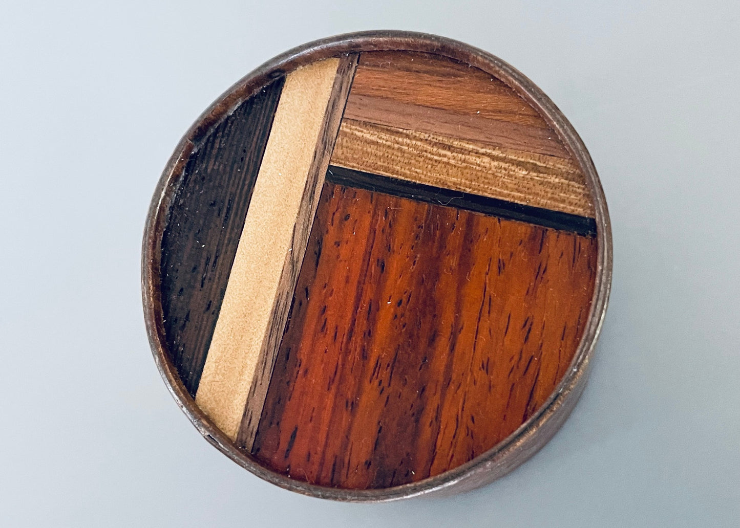 Large Round Burlwood Accent Table with M.U.T.T. Inset Top