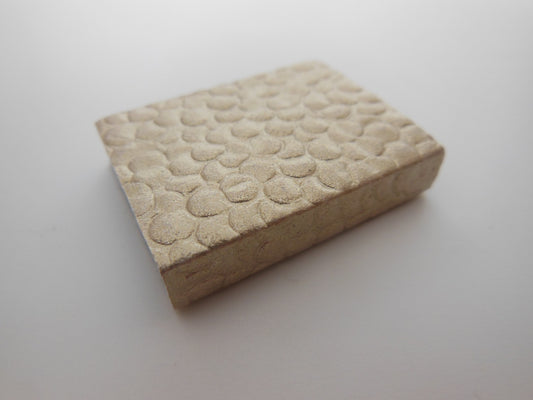 Gold Pebble Covered Book