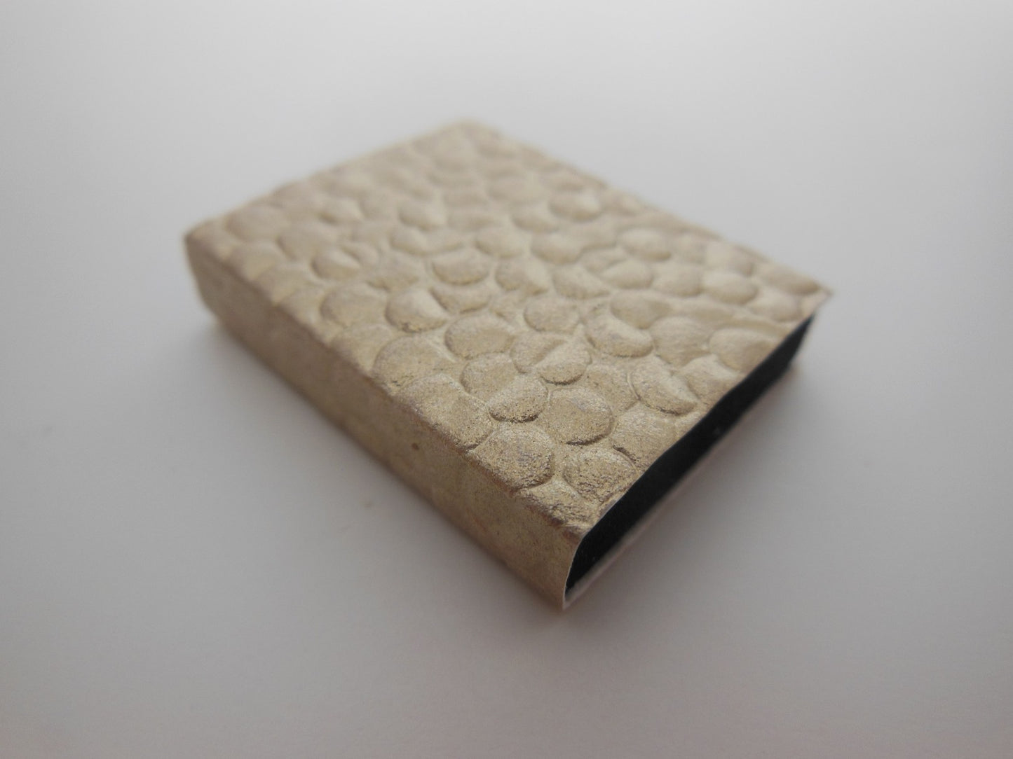 Gold Pebble Covered Book