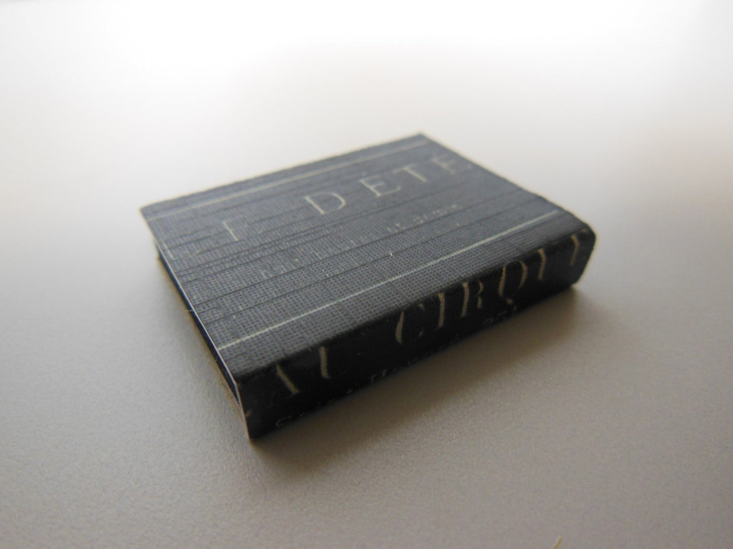 Black French Writing Covered Book