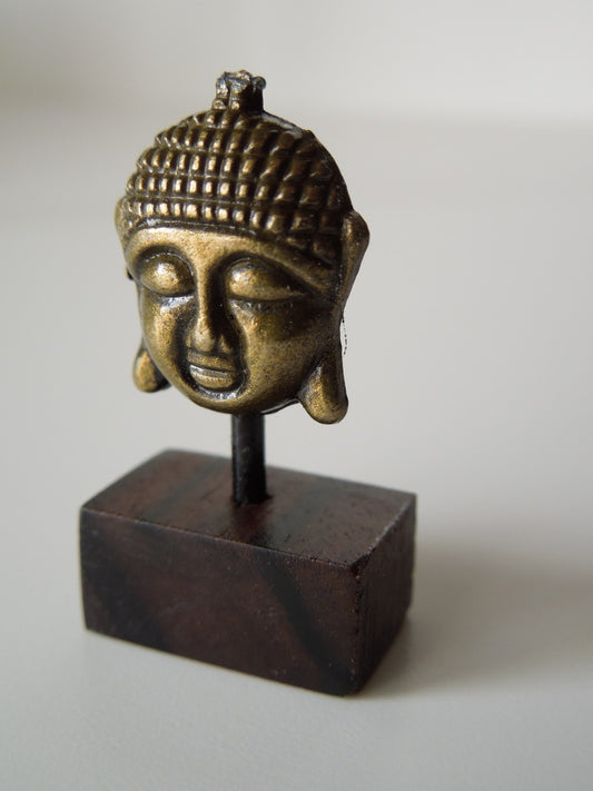 Small Gold Buddha Head on Dark Wood Base