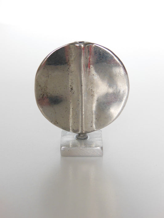 Metal Sculpture on Metal Base