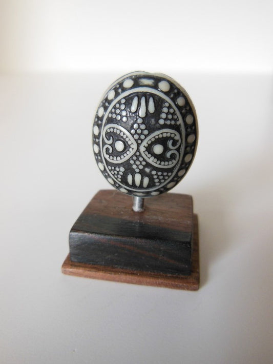 Black/White Tribal Sculpture on Dark Wood Base