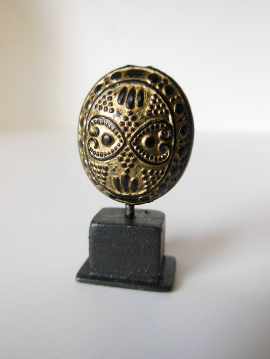 Gold/Black Tribal Sculpture on Dark Wood Base
