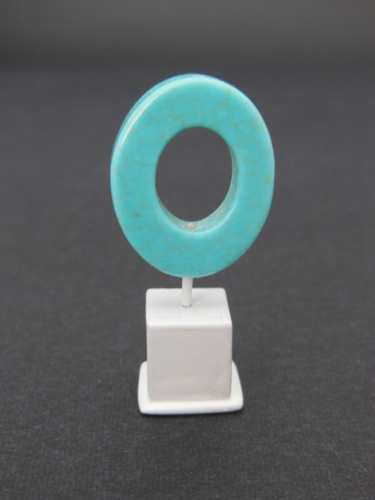 Turquoise Small Oblong Ring on White Base