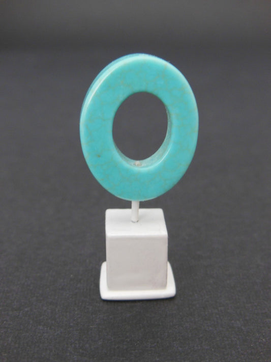 Turquoise Small Oblong Ring on White Base