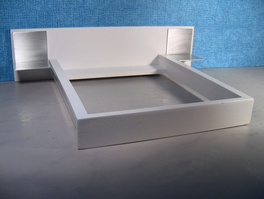 White Platform Bed with White Headboard and Aluminum Nightstands