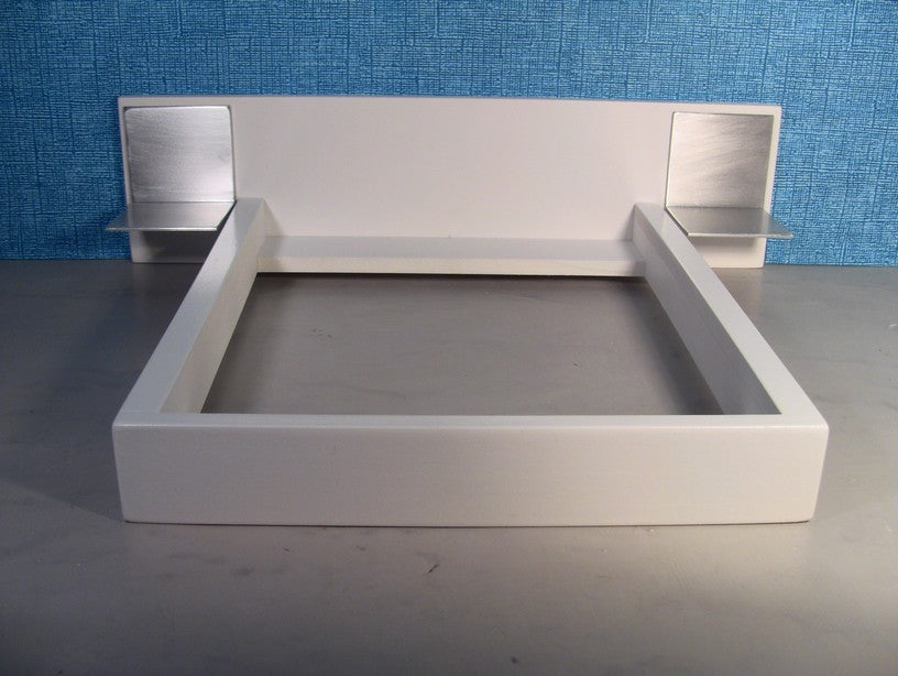 White Platform Bed with White Headboard and Aluminum Nightstands