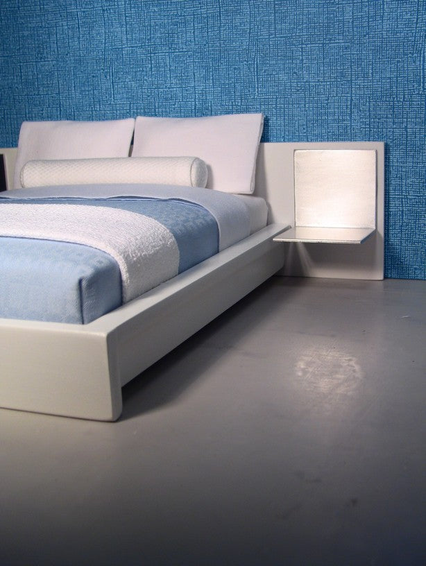 White Platform Bed with White Headboard and Aluminum Nightstands