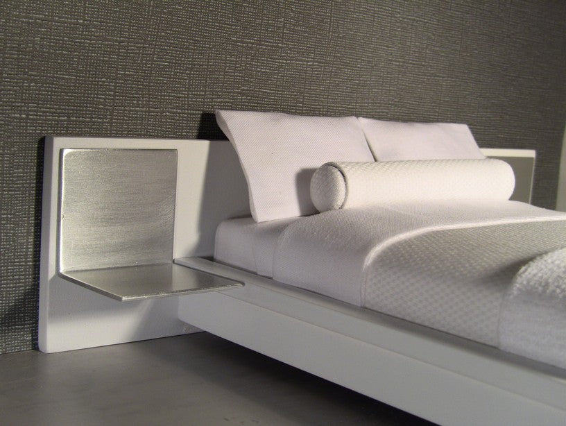 White Platform Bed with White Headboard and Aluminum Nightstands