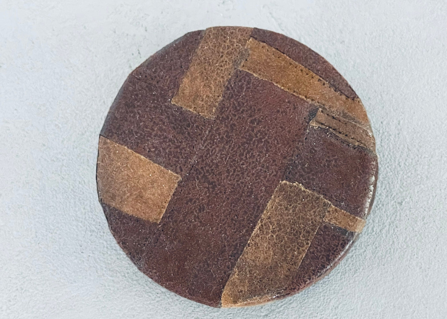 Round Ottoman in Vintage Brown Patch