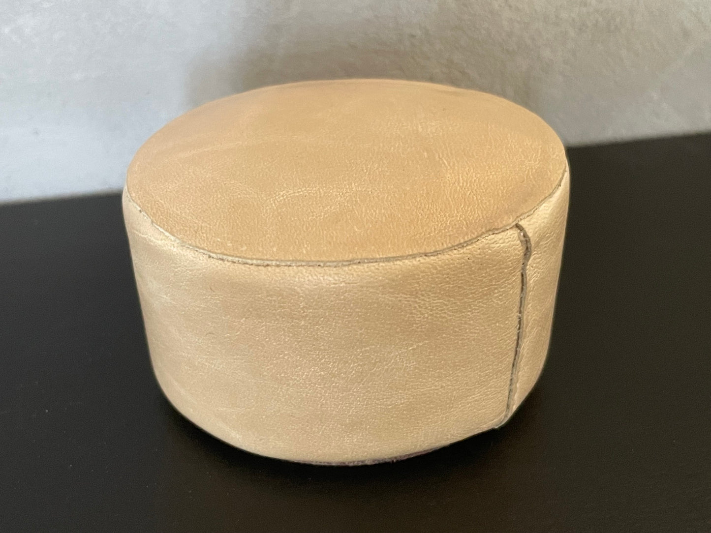 Round Leather Ottoman in Light Taupe