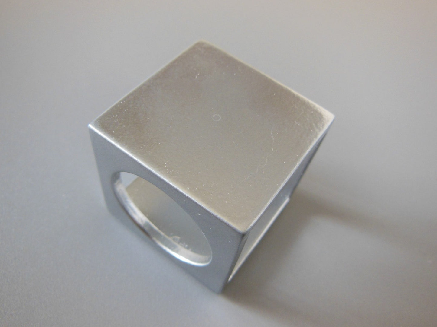 Spatial Side Table in Silver Metallic