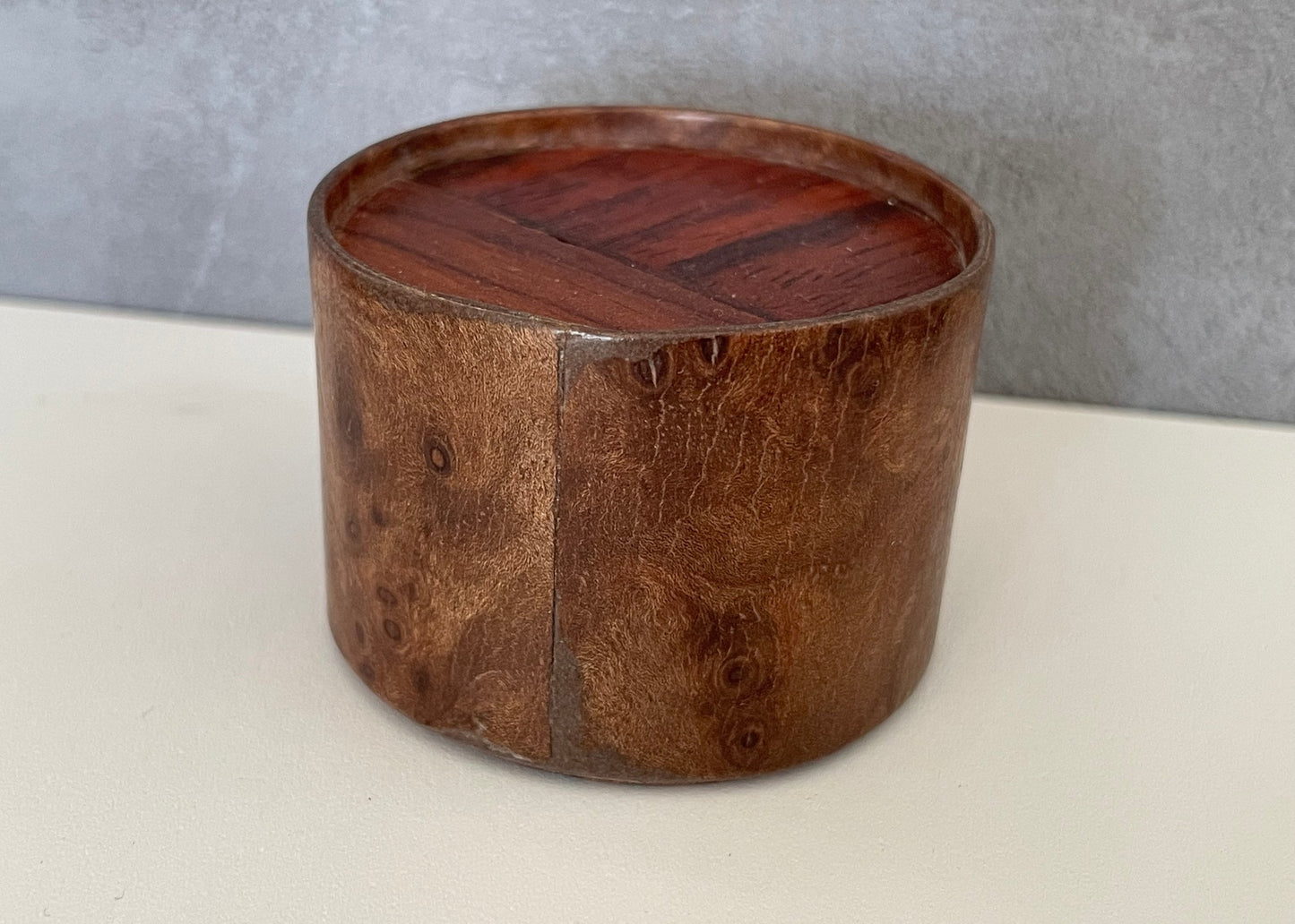 Small Round Burlwood Accent Table with M.U.T.T. Inset Top