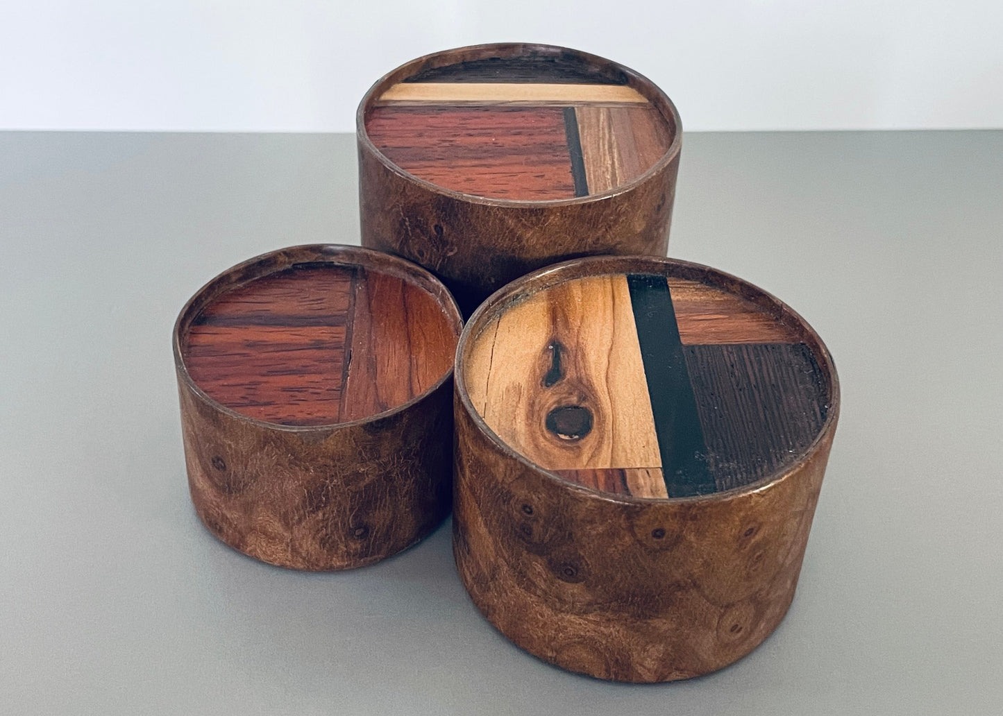 Small Round Burlwood Accent Table with M.U.T.T. Inset Top