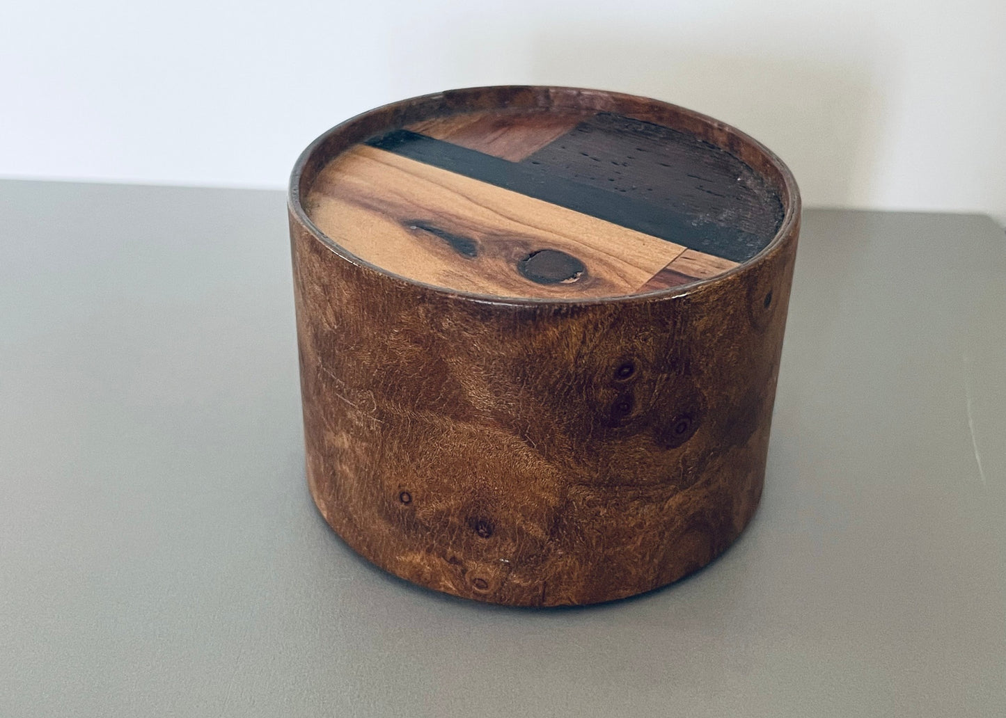 Medium Round Burlwood Accent Table with M.U.T.T. Inset Top