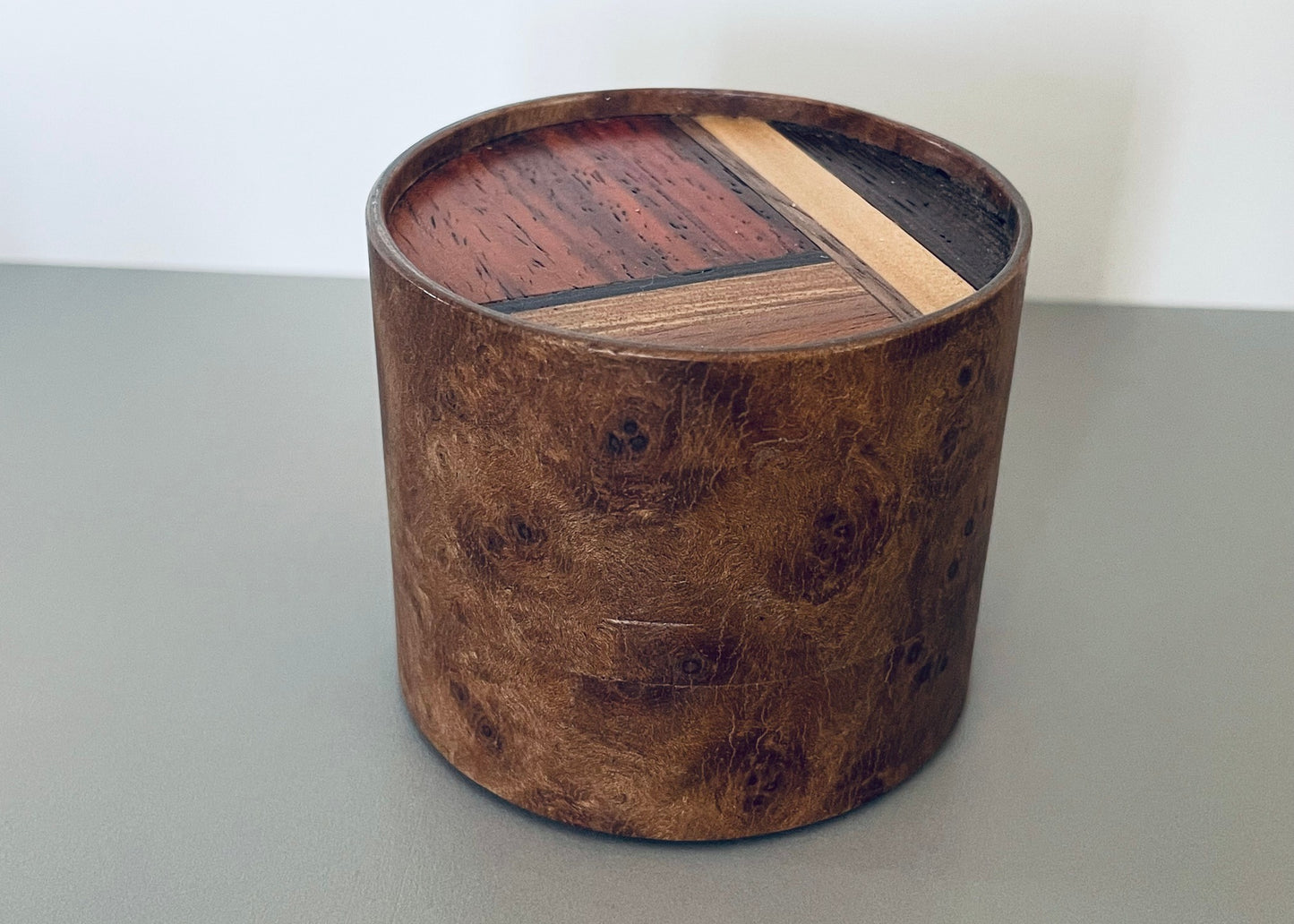 Large Round Burlwood Accent Table with M.U.T.T. Inset Top
